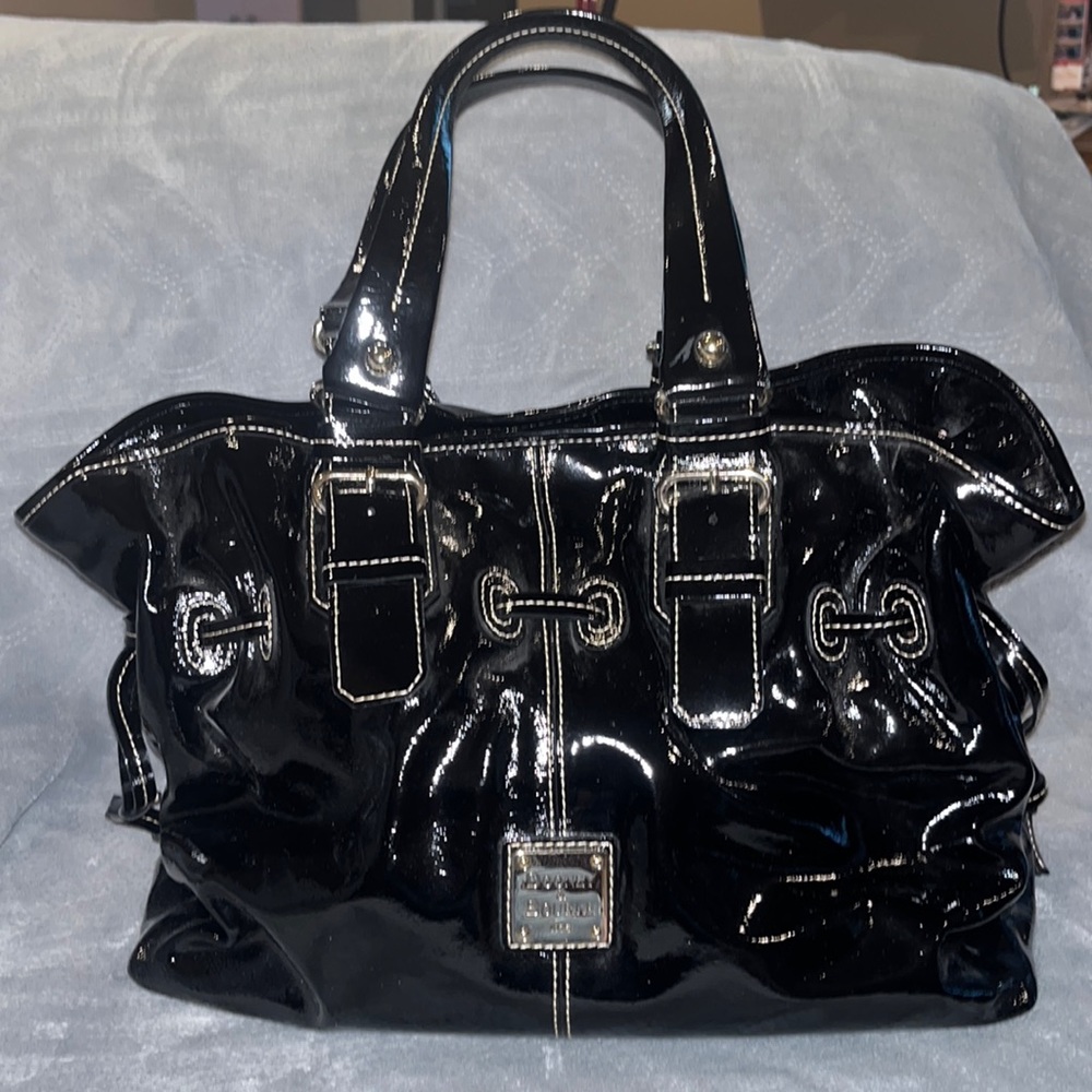 Dooney and Bourke black patent leather bag.
